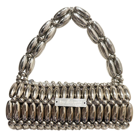 Silver beaded handbag on a white background