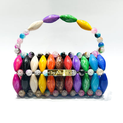 Colorful beaded handbag with a visible brand logo on a white background