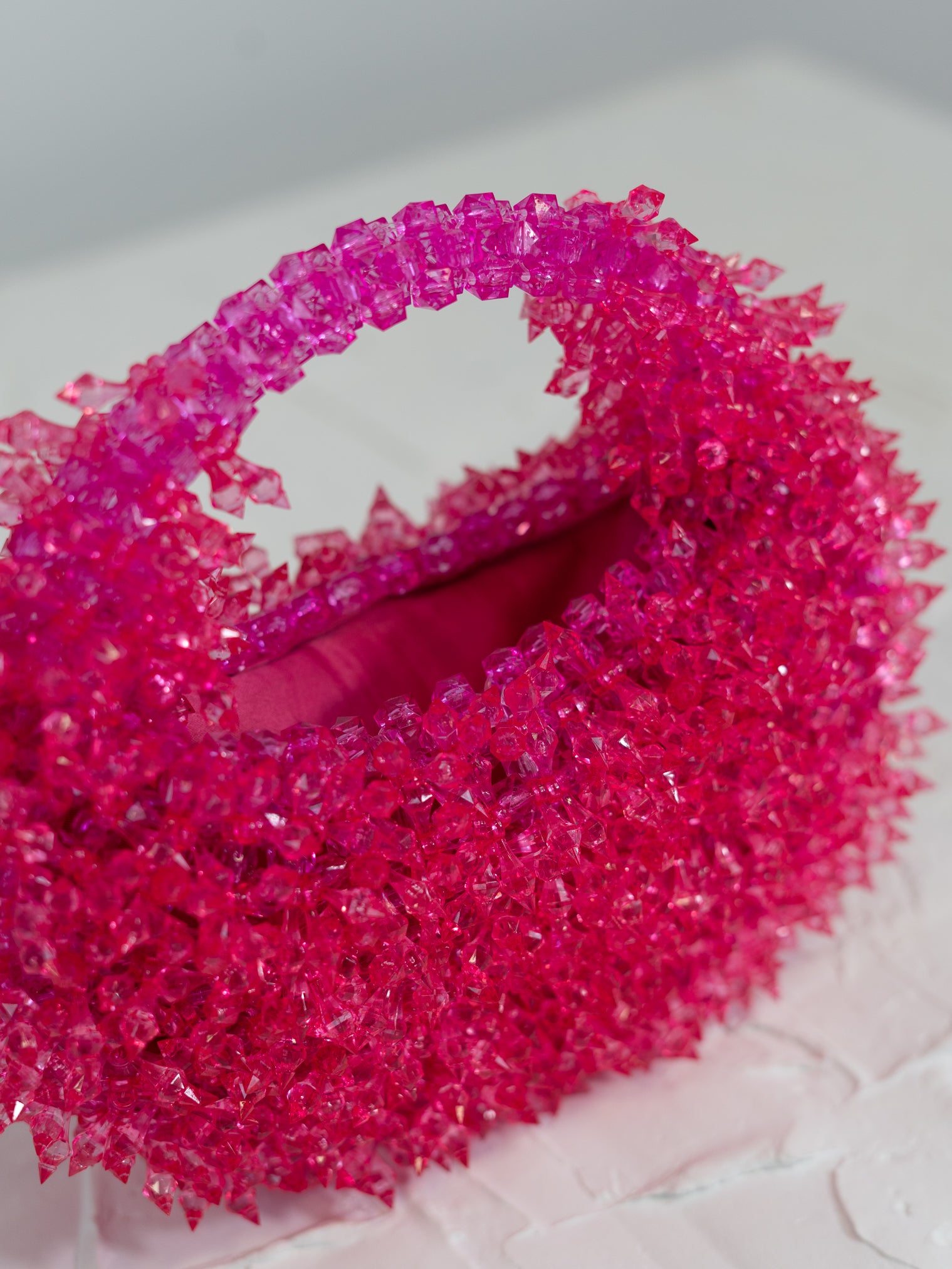 Inside hot pink spiked handbag
