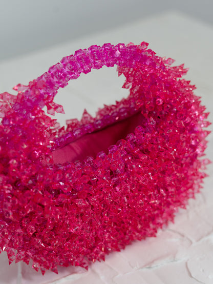 Inside hot pink spiked handbag