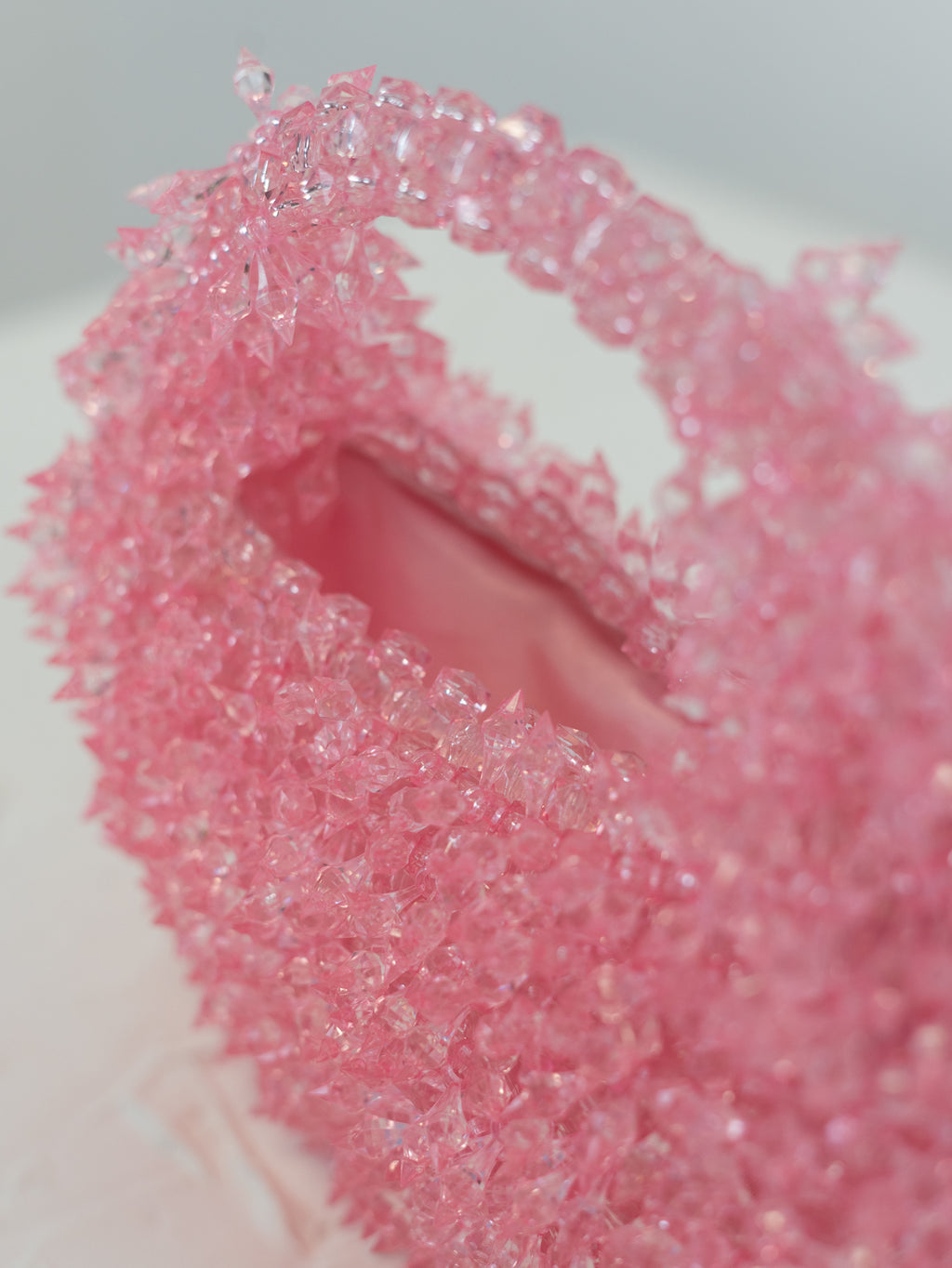 Close up of the inside of the Spiky Baby Pink beaded bag