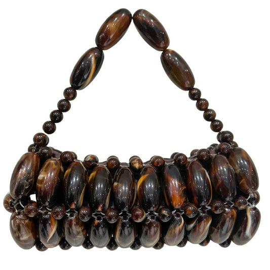 A handcrafted handbag made with beads, featuring a geometric pattern with a coffee color palette.