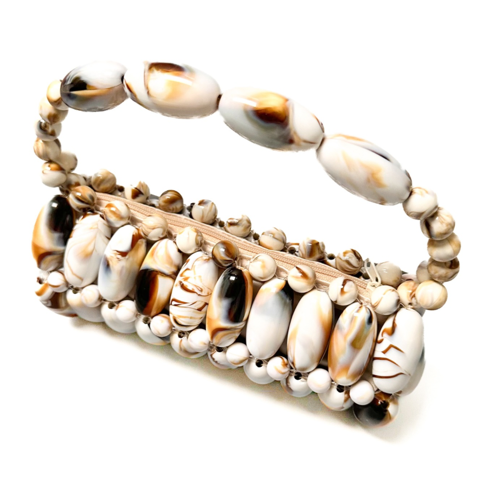 Top view of cream marble beaded bag displaying zip structure - brown, cream marble tones