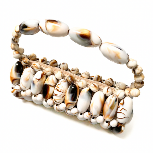 Top view of cream marble beaded bag displaying zip structure - brown, cream marble tones