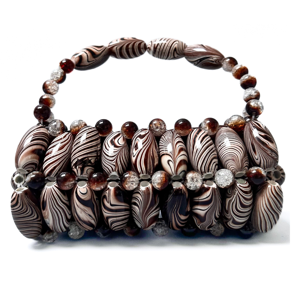 Close up of handmade beaded bag in brown zebra, part of the monochrome marble collection - brown, light brown, dark brown striped tones