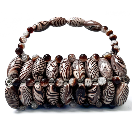 Close up of handmade beaded bag in brown zebra, part of the monochrome marble collection - brown, light brown, dark brown striped tones
