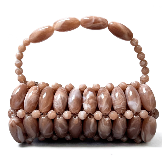 Close up of handmade beaded bag in neutral stone - light beige, brown marble tones