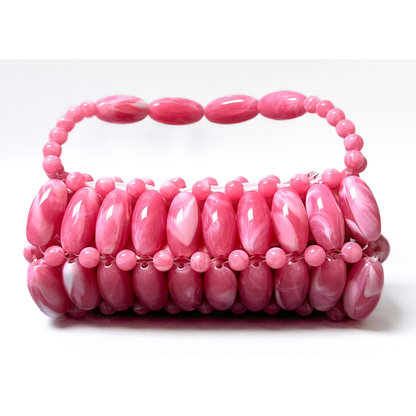 Close up of fuchsia pink beaded bag