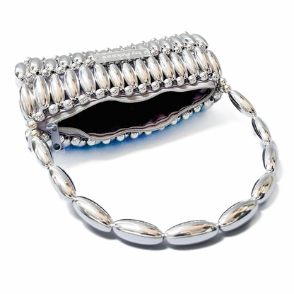 Lay flat view of platinum barrel beaded bag standard showing inside and zip pouch in grey/silver