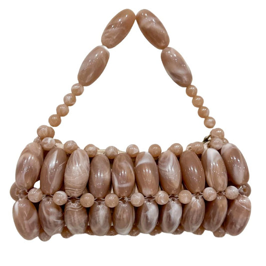 A handcrafted handbag made with handpicked beads in brown and beige tones.