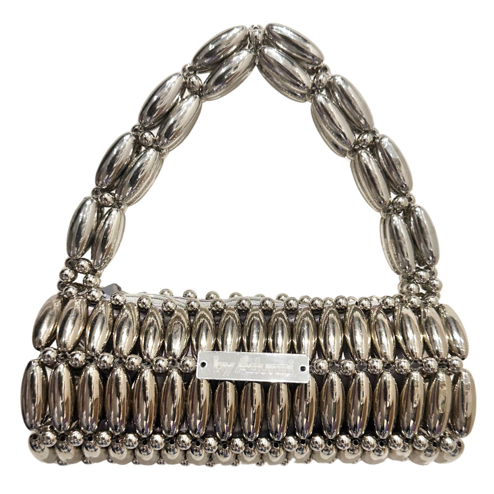 Silver beaded handbag on a white background