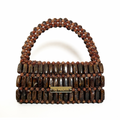 Front view of the Coffee XL handmade beaded bag in brown and terracotta marble